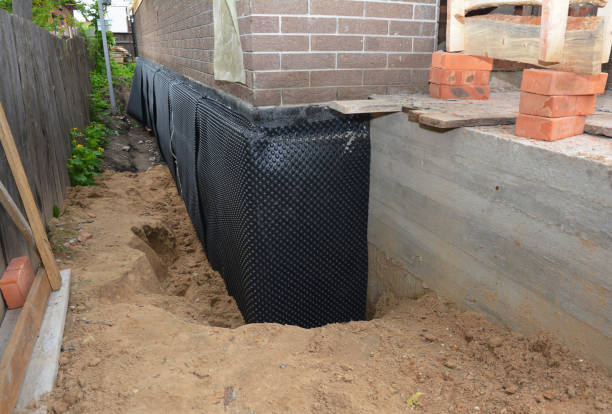 SJ Waterproofing Pros technician performing targeted Foundation Crack Repair assessment in Morrisonville, NY